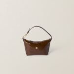 Naplak patent leather pouch